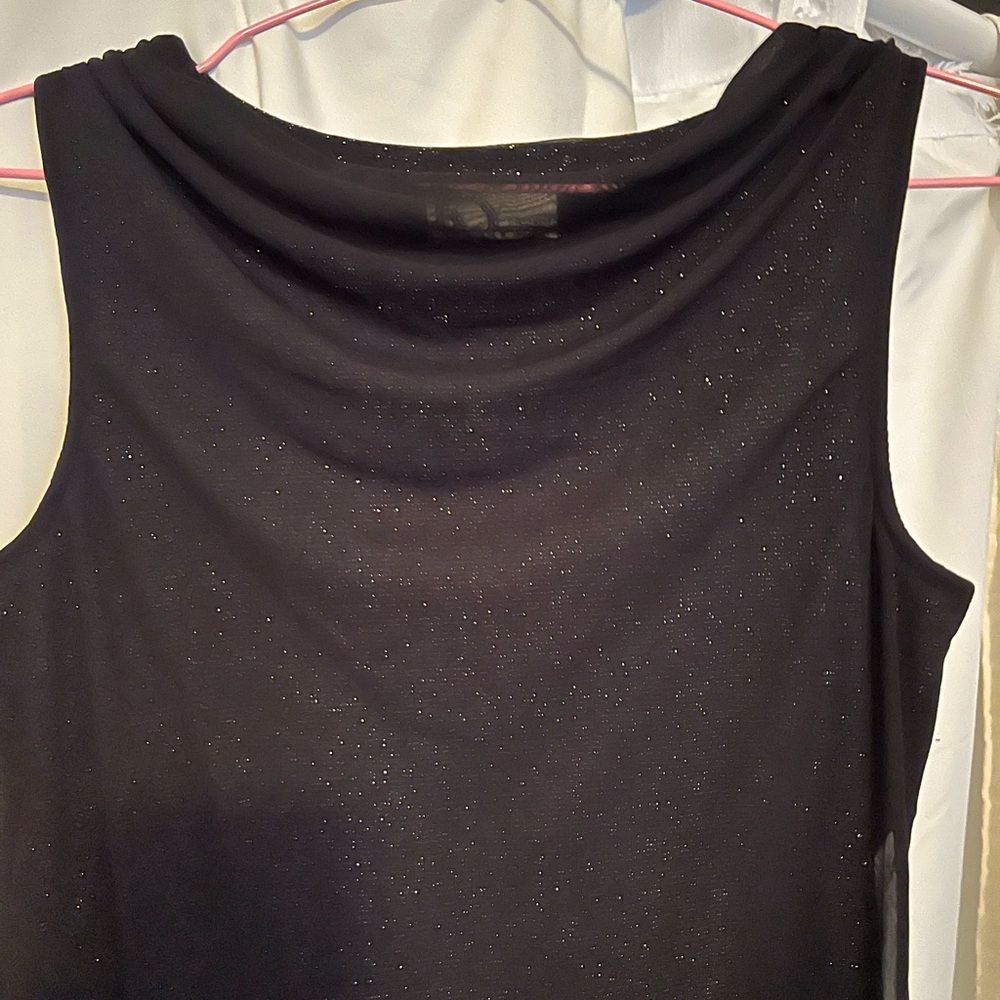 Black cocktail dress with delicate shimmer